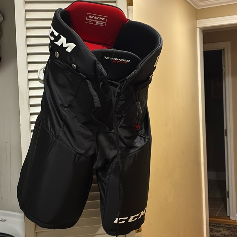 CCM Black and Red Hockey Pants